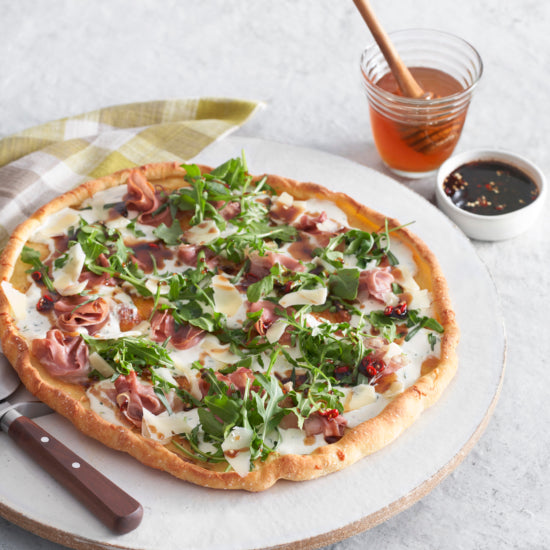 Prosciutto Ricotta Pizza with Herbs, Arugula & Balsamic Hot Honey – Hilltop Apiaries